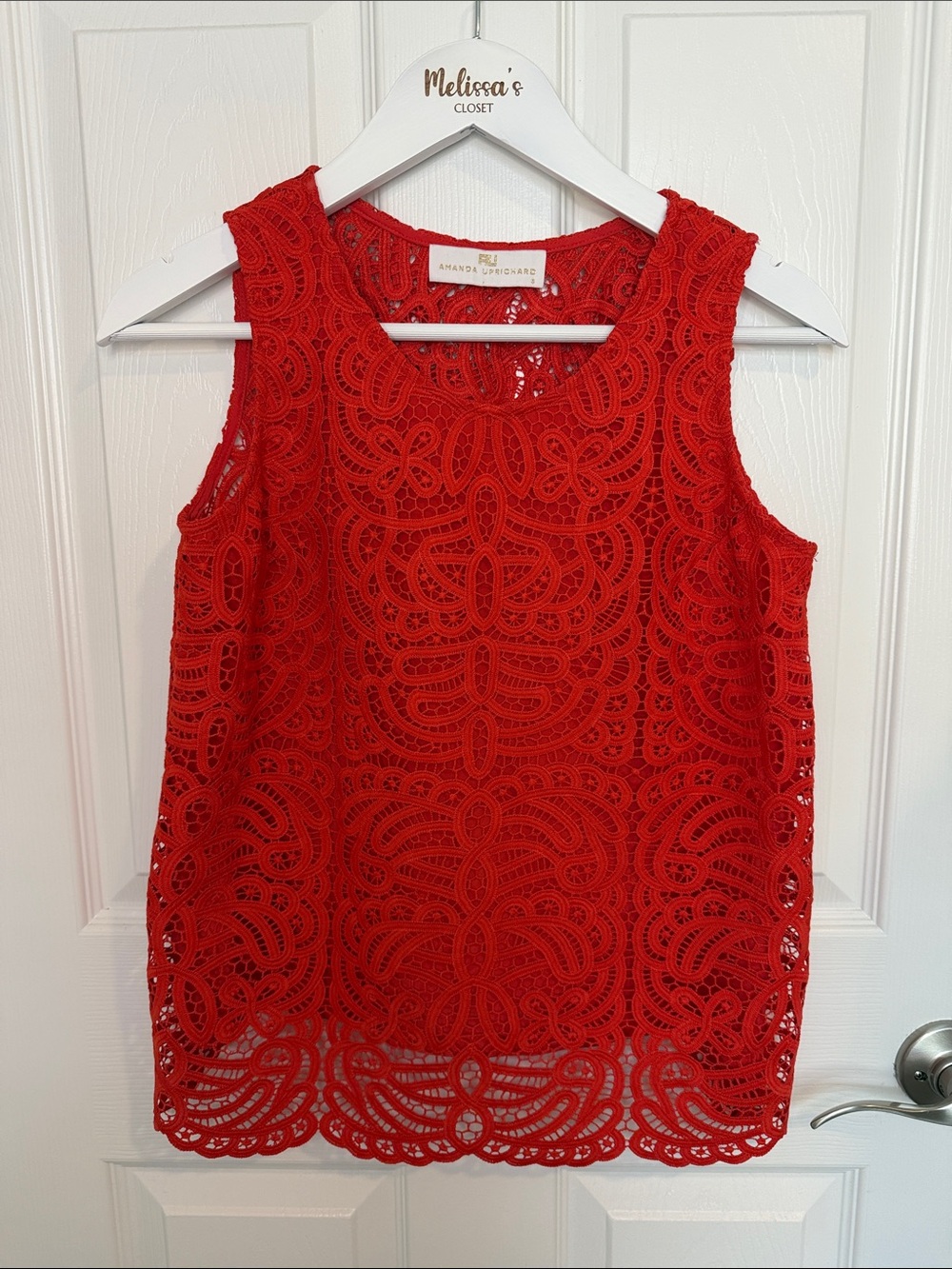 Amanda Uprichard Red Crochet Lace Tank Top lining in front of. Open back